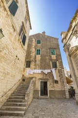 Fototapeta na wymiar Clothes hanging in an alley in Dubrovnik, Croatia.