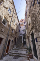 Fototapeta na wymiar Old quiet alley in the old city of Dubrovnik, Croatia.