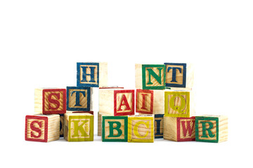 The wooden alphabet blocks on a white background