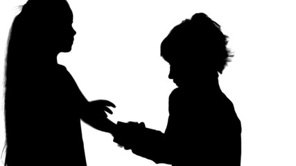 Silhouette Pretty caucasian woman getting chrismas gift from her daughter track matte