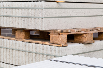 Concrete blocks on palette on building construction site