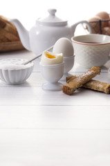 Fototapeta na wymiar Soft Boiled Egg and Soliders for Breakfast