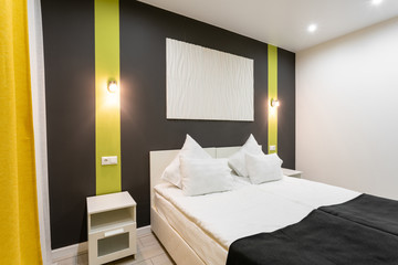 Hotel standart room. modern bedroom with white pillows. simple and stylish interior. interior...