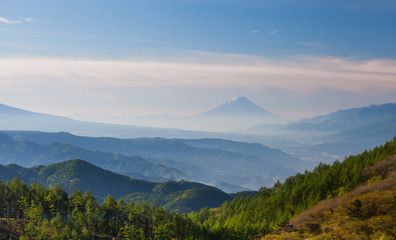 Mountain Fuji with morning mist in spring season