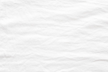 Fototapeta na wymiar Wrinkled white cotton fabric textured background, Fashion pattern textile design concept background