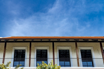 Windows on brown concrete wall