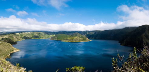 Panoramic of Cuicocha, beautiful blue lagoon inside the crater of Cotacachi volcano near Otavalo © Benedict