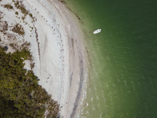 beach aerial drone above view white sand boats sea water island