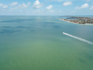 beach aerial drone above view white sand boats sea water island