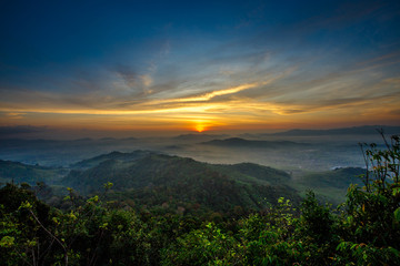 Naklejka premium The sun is rising from the mountains, fresh morning. Colorful and memorable