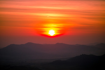 The sun is rising from the mountains, fresh morning. Colorful and memorable