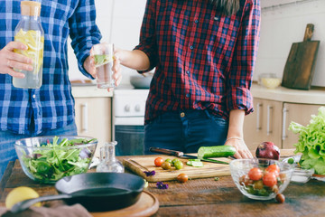 Couple preparing healthy light dinner home kitchen Healthy food concept