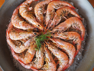   Closeup of shrimps on pan with pepper