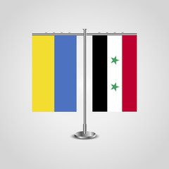 Table stand with flags of Ukraine and Syria.Two flag. Flag pole. Symbolizing the cooperation between the two countries. Table flags