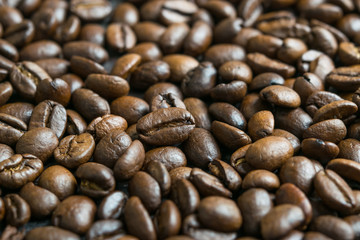 Coffee beans on wooden table