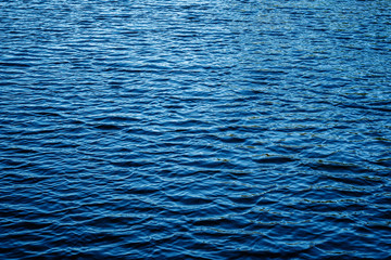Waving water surface of river