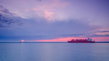 LNG TANKER - Sunrise over a tanker at the gas port in Swinoujscie   © Wojciech Wrzesień