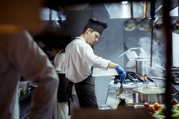 Chef working on the kitchen