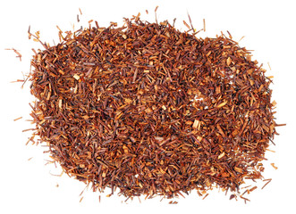 A bunch of dry red Mexican tea lies on a white table.