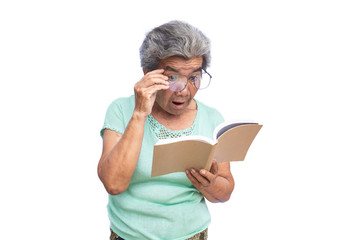 Old woman reading a book on white background