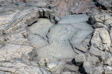 Ancient lava flow rock as a nature background, with texture and pattern, Hawaii
