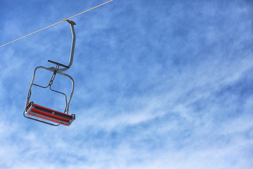 Ski lift on sunny winter day