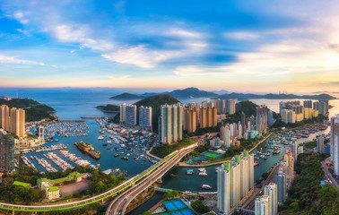 Panoramic Aerial view of the Aberdeen Harbour (Aberdeen Typhoon Shelter) and Ap Lei Chau Bridge in...