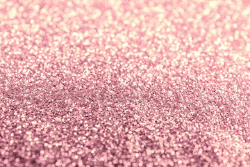 Texture of rose gold glitter fabric as background