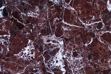 The red marble. Texture.