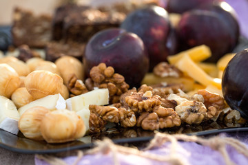 Snack to wine: walnuts, plums and cheese. For a romantic evening. For the wedding table. For a party of girls.