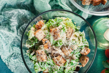 Healthy caesar salad with cheese and croutons