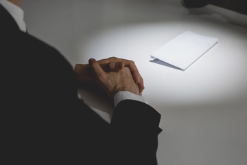 Naklejka premium Businessman offering money in the envelope on the table to his partner in bribery scam