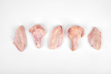 Raw chicken wings isolated on white background