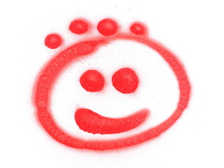 Red spray stain, graffiti smiley face, emoji isolated on white background, clipping path