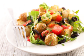 vegetable salad with potato, tomato and olive