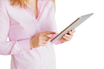 Woman using tablet. Isolated on white background.