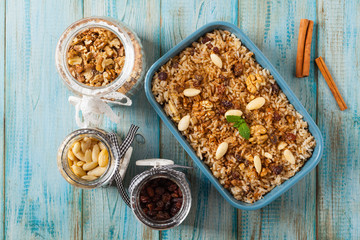 Traditional, mexican baked sweet rice, with almonds, raisins and walnuts.