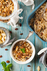 Traditional, mexican baked sweet rice, with almonds, raisins and walnuts.