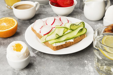 Various healthy breakfast on gray background