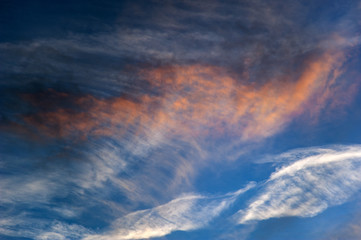 Bright sunset sky with clouds