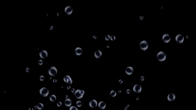 Bubbles floating rapidly upwards