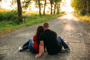 Fototapeta premium A love story in a fairy forest with a guy and a girl. Youth in nature