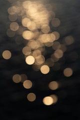 golden bokeh shiny lights, background sunset