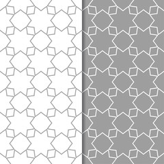 Gray and white geometric ornaments. Set of seamless patterns