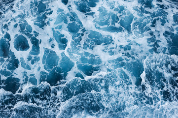Fototapeta premium Background: white foam on sea water.