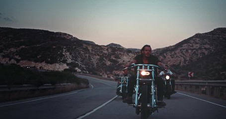 Young rebel men riding motorcycles on mountain road trip - Powered by Adobe