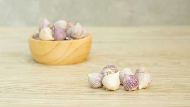 Elephant Garlic (Allium Sativum Linn.) on a wooden table.