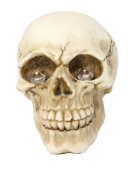 human skull with precious diamonds in the empty eye sockets