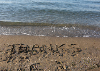 THANKS on the sand by the sea