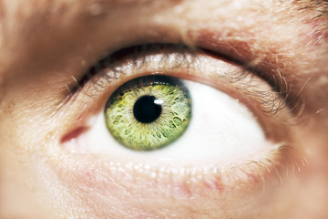 Image of man's beautiful insightful look eye close up.
